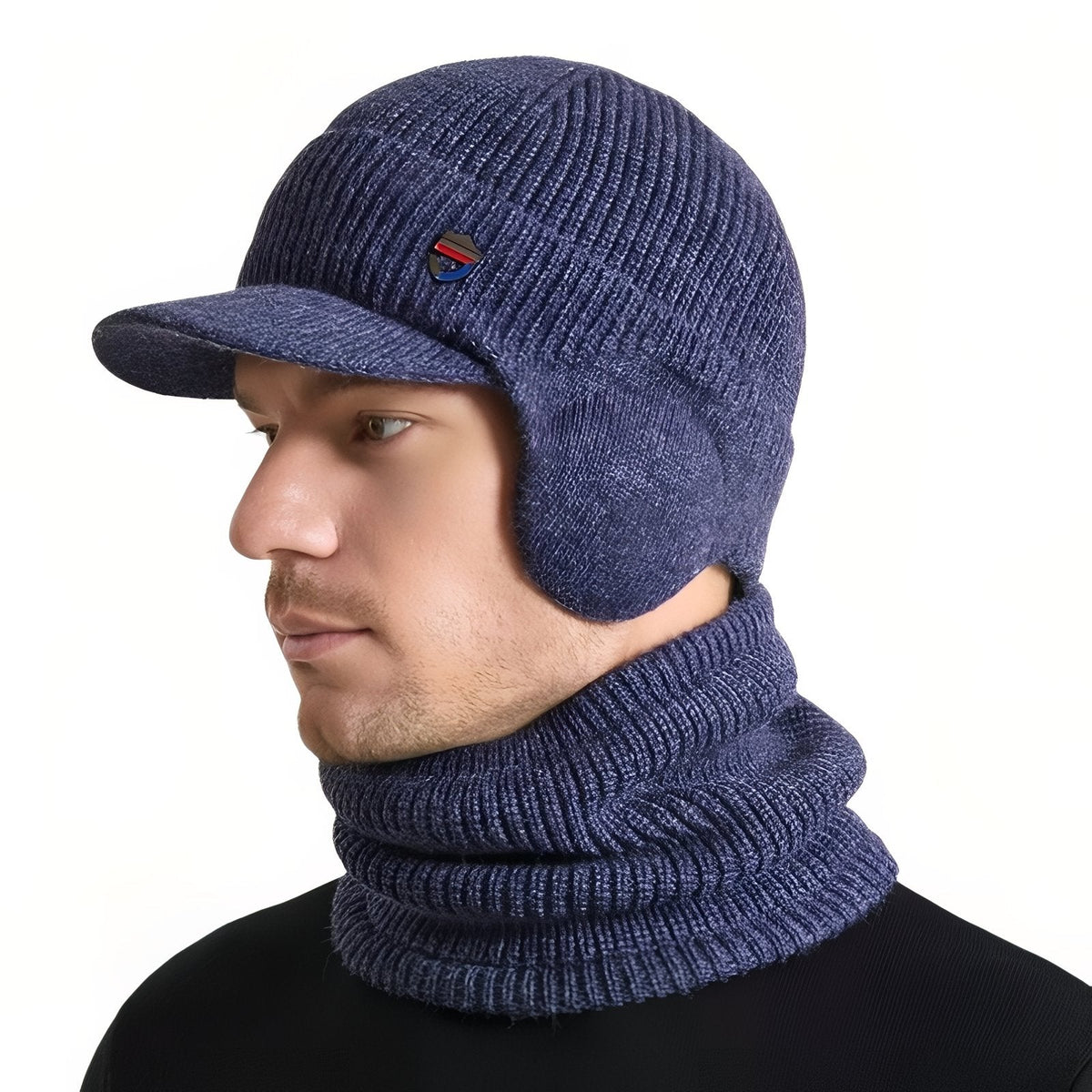 Man wearing the denim blue knit winter hat with brim and ear flaps and the matching neck warmer