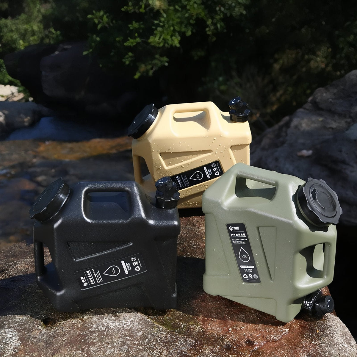 The water container in sand, black and olive green on rocks outdoors