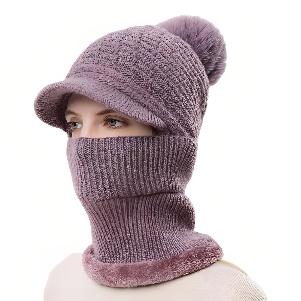 Woman wearing the pale purple brim beanie with the ribbed neck warmer pulled up over her nose