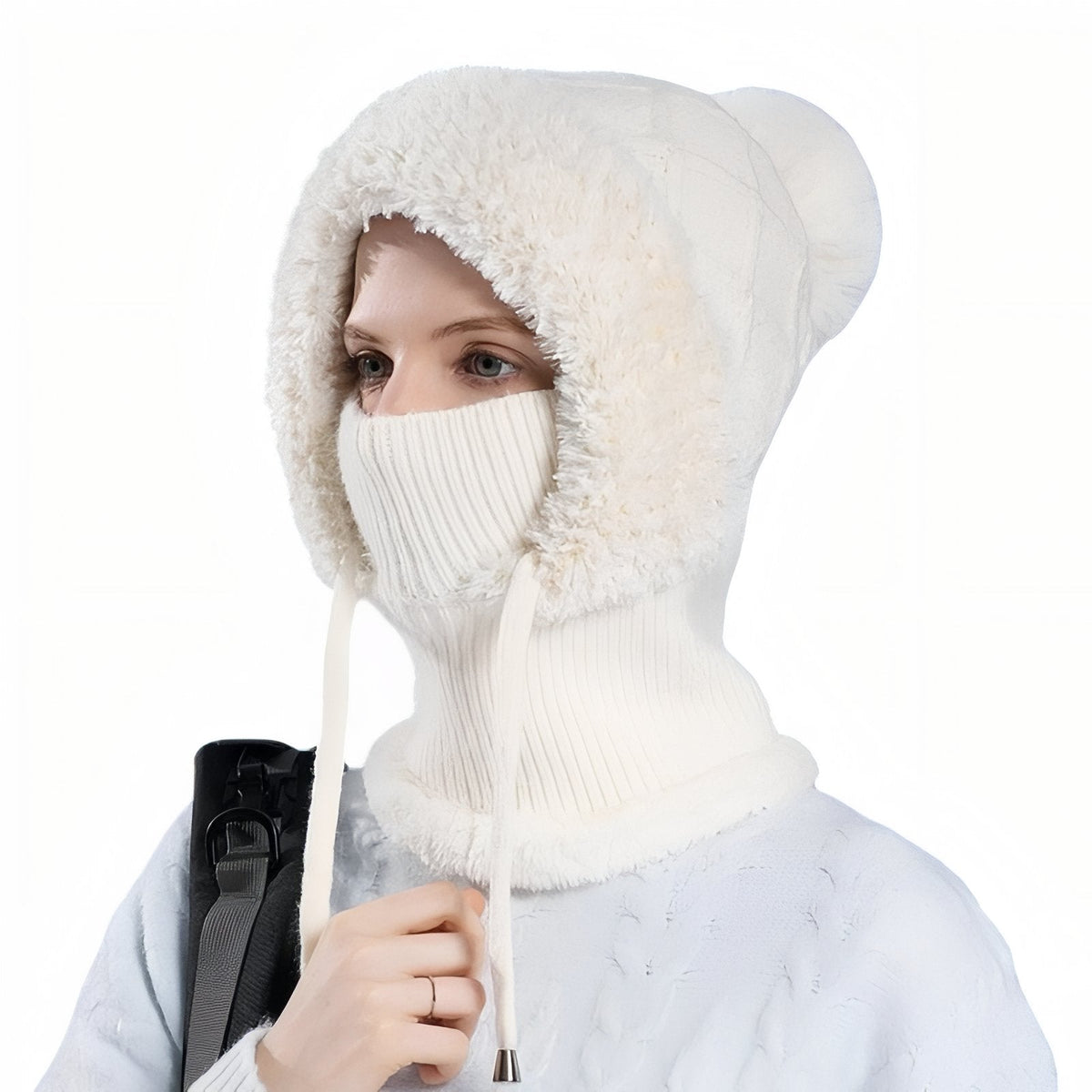 Woman wearing the cream white balaclava hood, mask over the nose, white drawcords at the sides