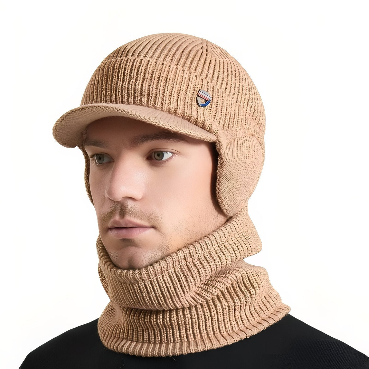 Man wearing the camel knit winter hat with brim and ear flaps and the matching neck warmer