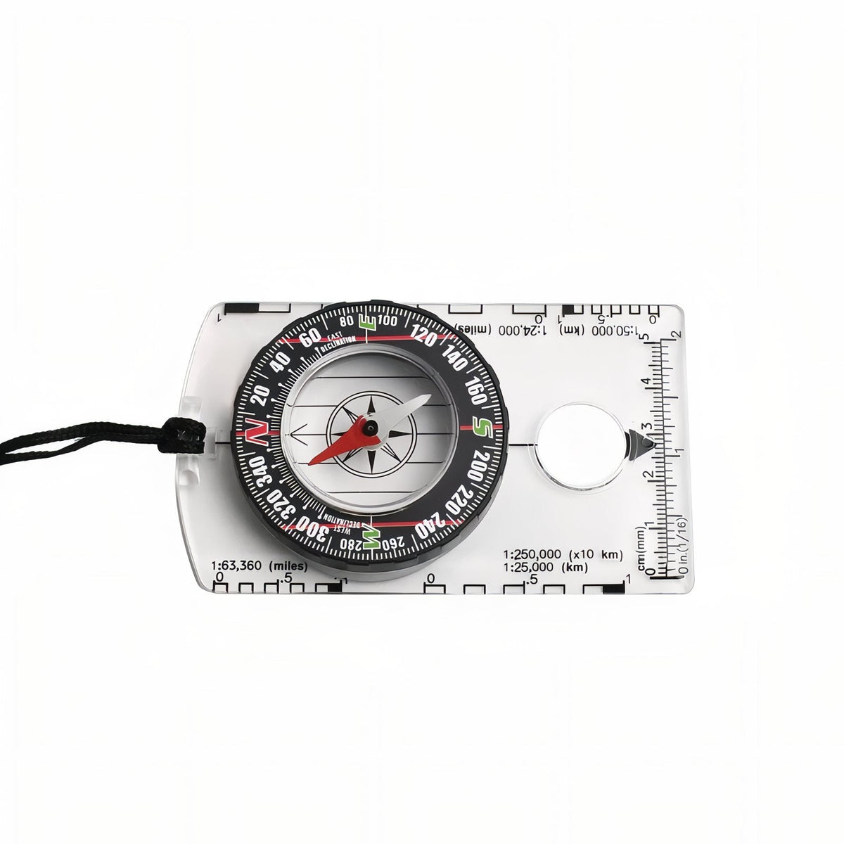 Clear baseplate compass lying flat, showing the 1:63,360, 1:250,000 and 1:25,000 map scales on its edges