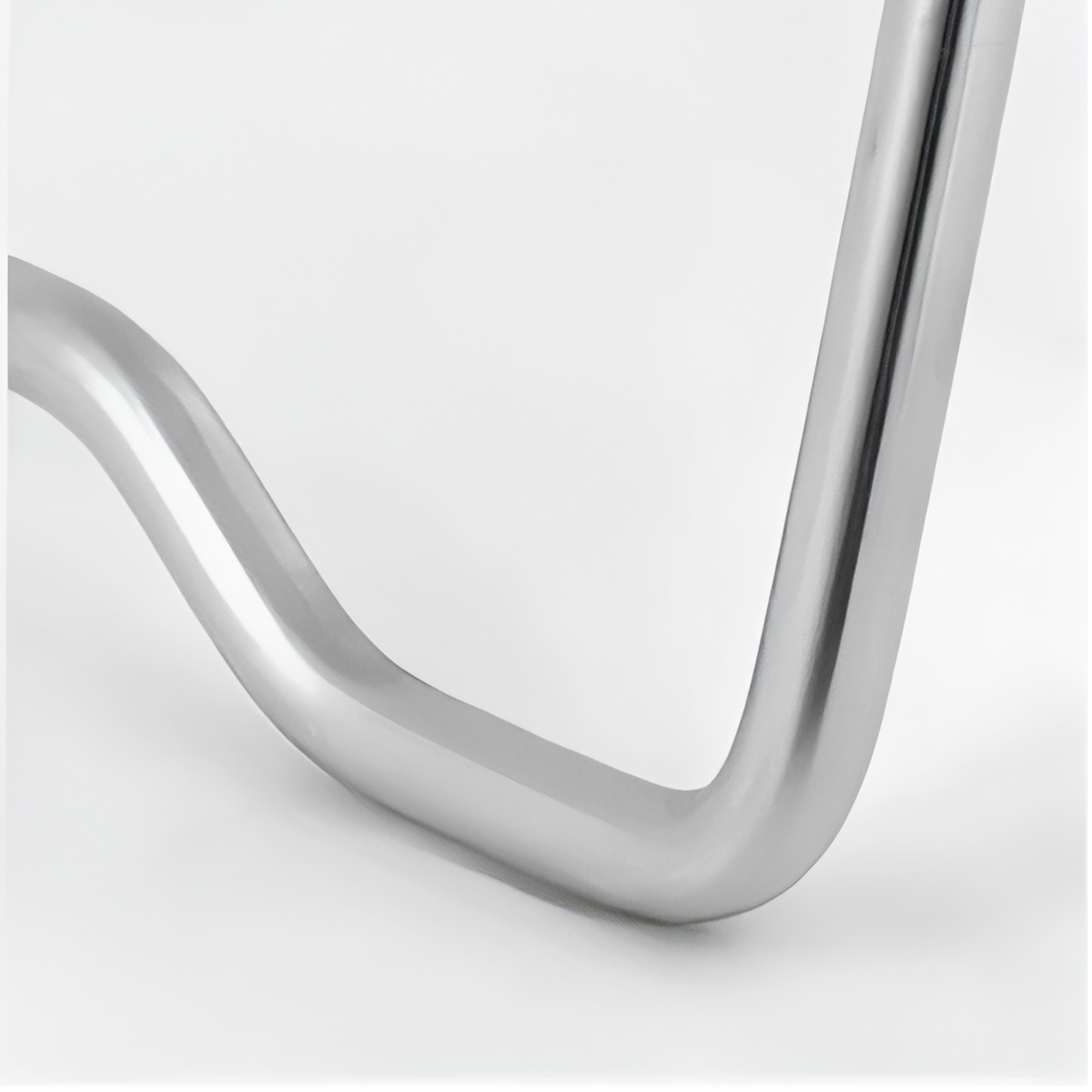 Close-up of a bent stainless steel wire leg