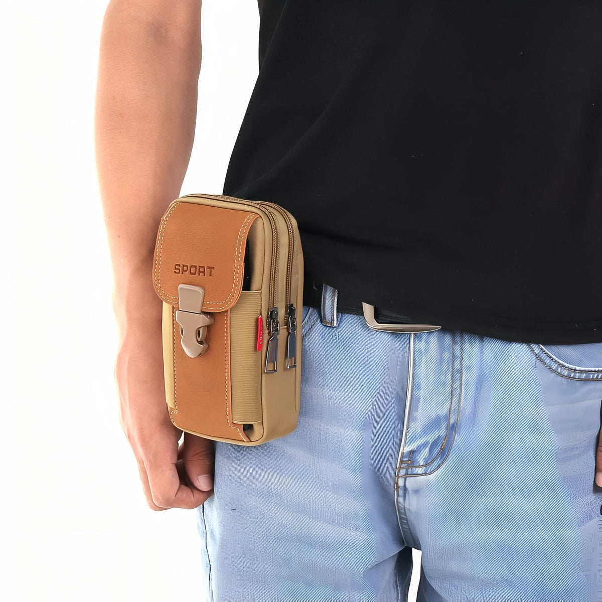The brown vertical pouch worn on a belt with jeans