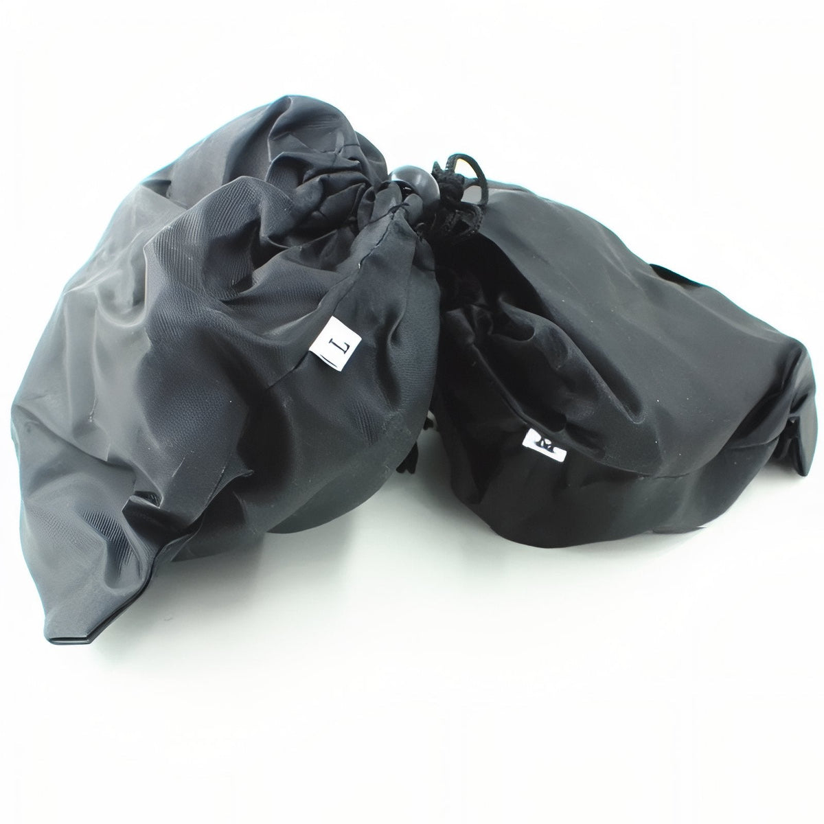 Two dark drawstring storage bags for the crampons