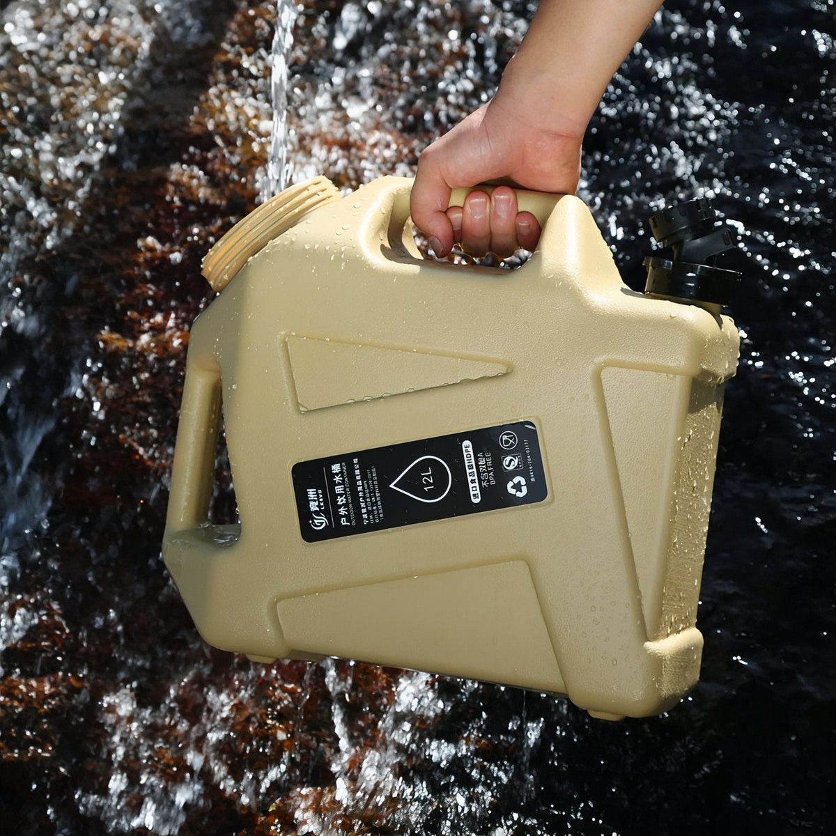 Hand holding the sand water container in a splashing stream