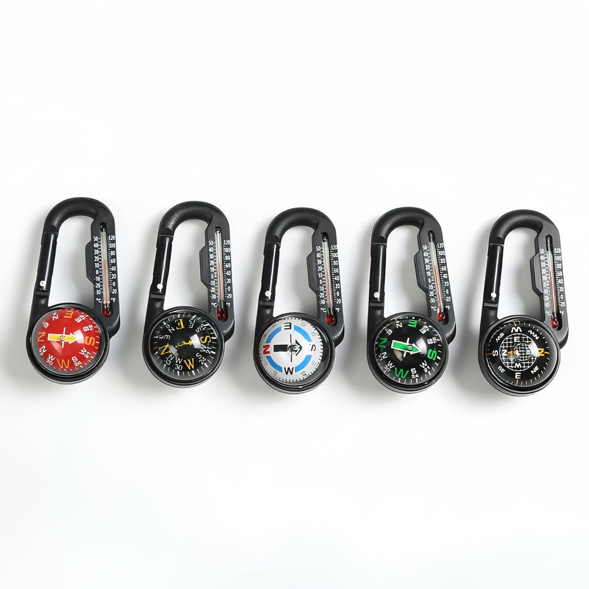 Five compass carabiners in a row: red, black, white, green and black dials
