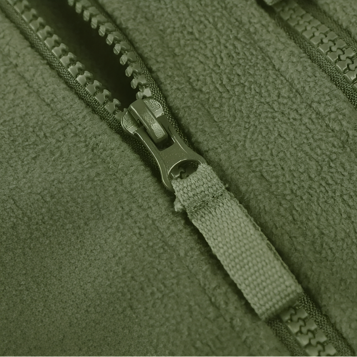 Close-up of the olive green fleece with the main zip and its fabric pull