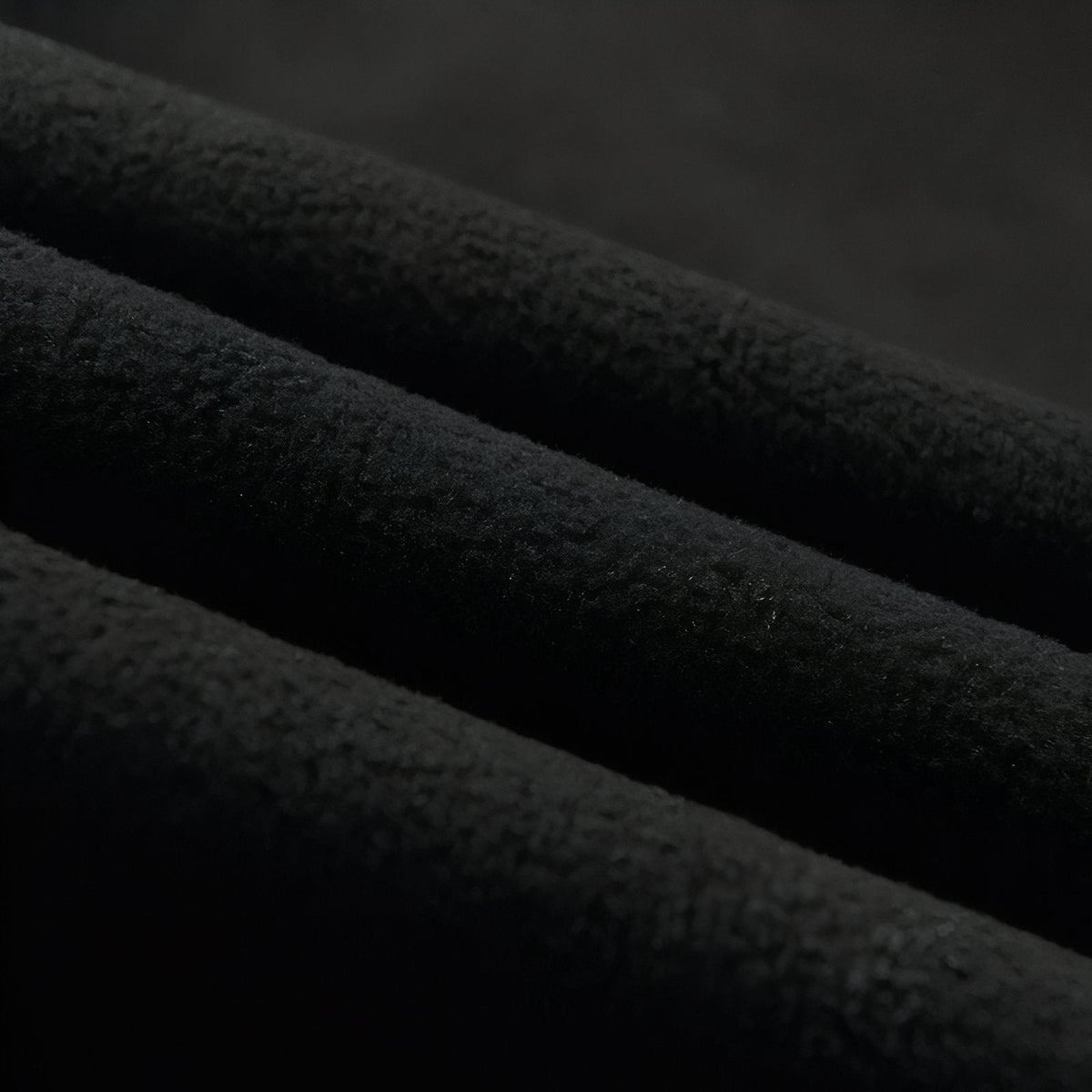 Close-up of the soft black brushed fleece lining