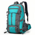 Turquoise and grey hiking backpack, front three-quarter view with hip belt