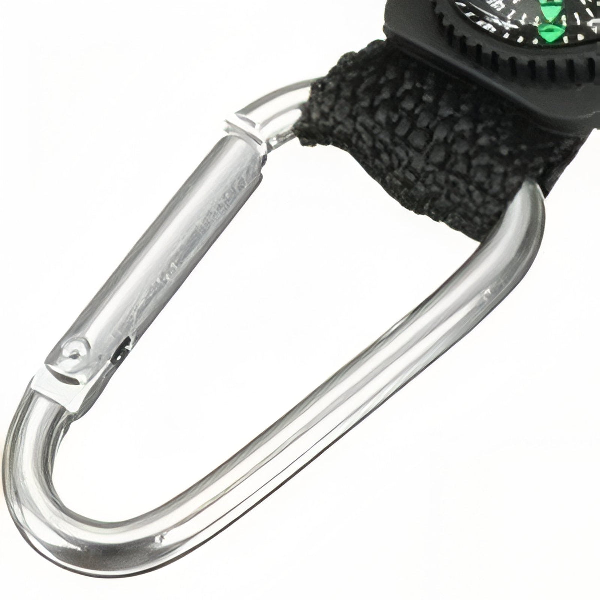 Close-up of the silver carabiner clipped through the black webbing loop
