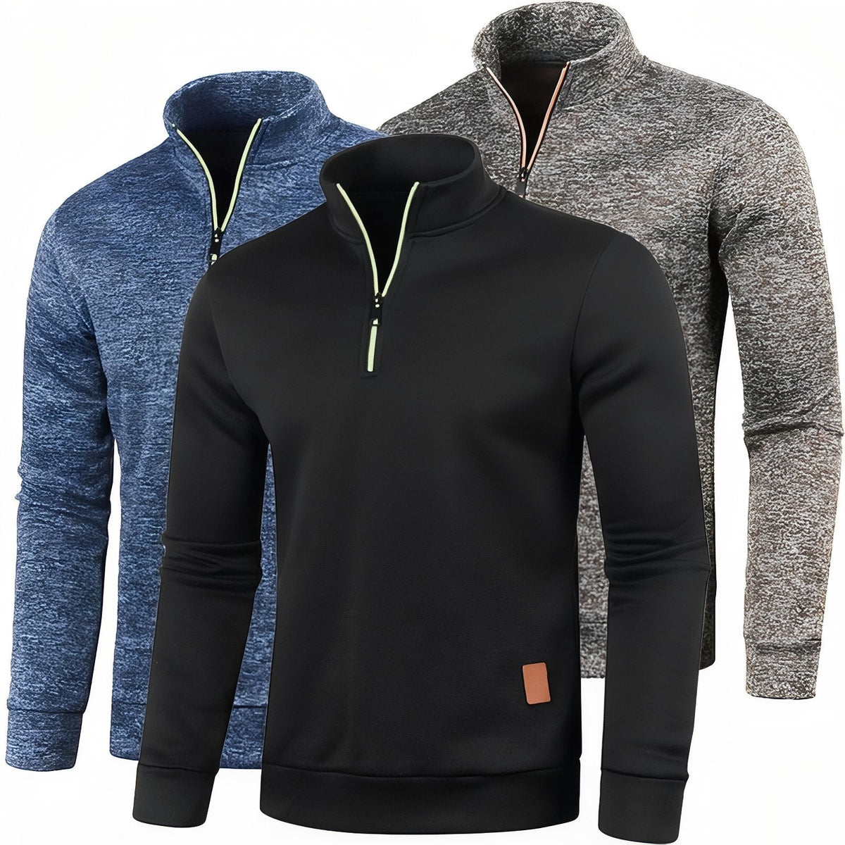 The quarter-zip pullover in heather blue, black and coffee laid side by side