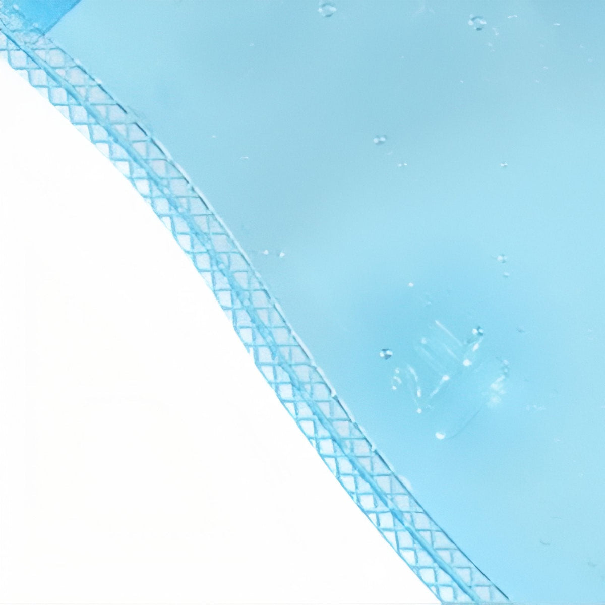 Close-up of the clear blue bladder material and its welded edge