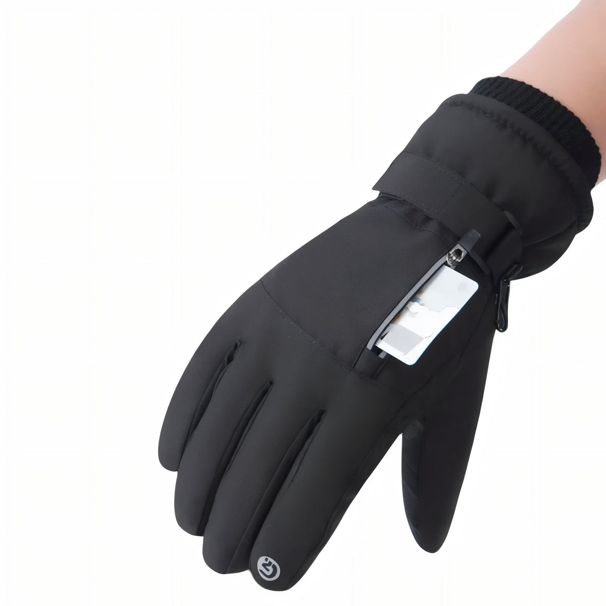 Hand in a black winter hiking glove with a card tucked into the open zip pocket on the back of the hand