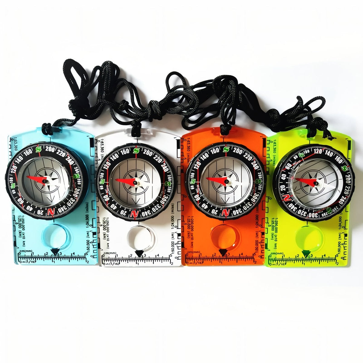 Four baseplate compasses side by side in blue, clear, orange and neon yellow, each with a black lanyard