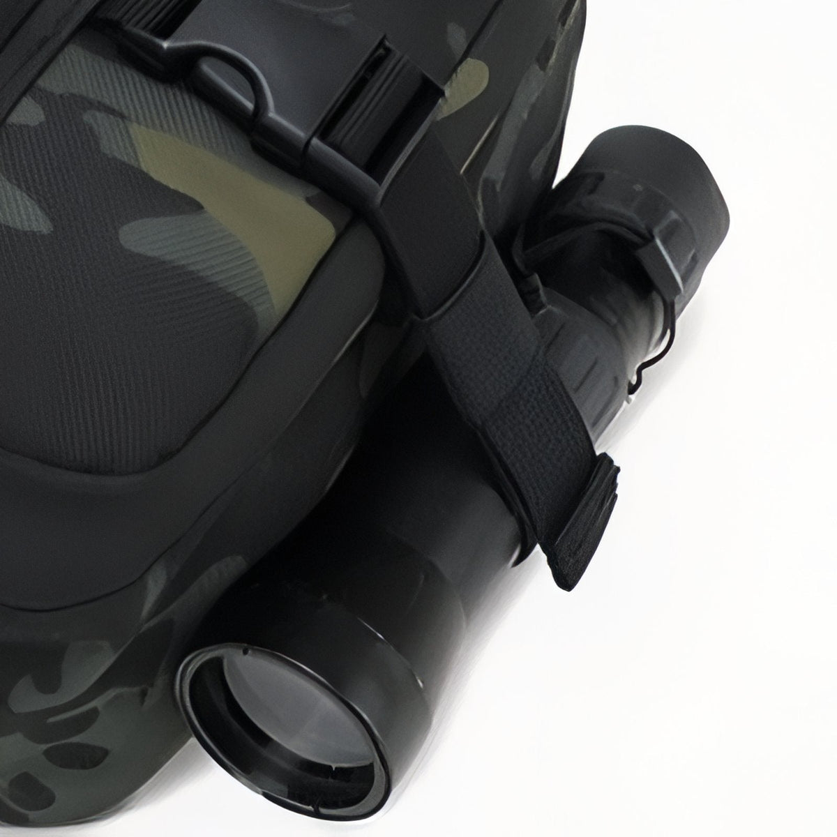 Torch clipped to the sling bag's strap