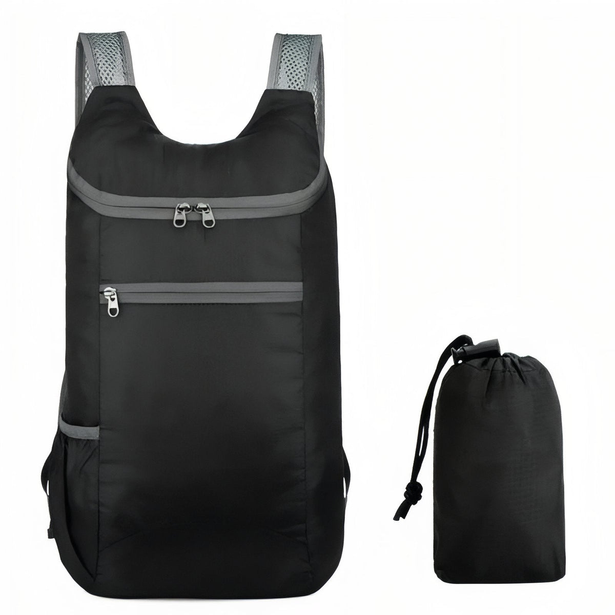Black packable daypack with grey trim beside its drawstring stuff sack