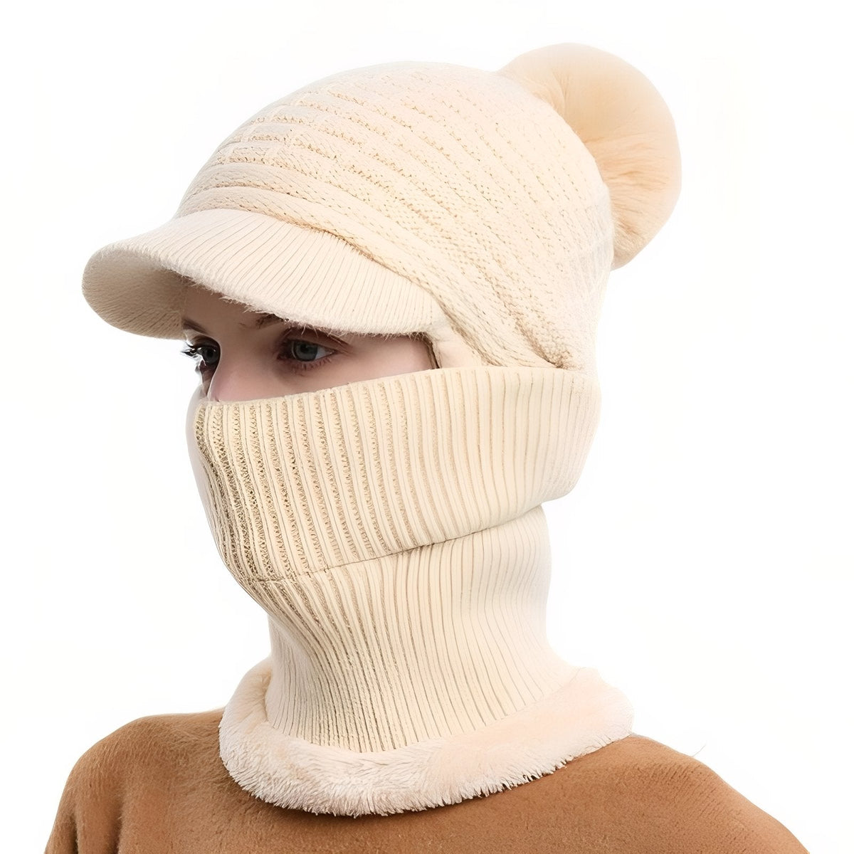 Cream brim beanie with a cream pompom and the neck warmer pulled up