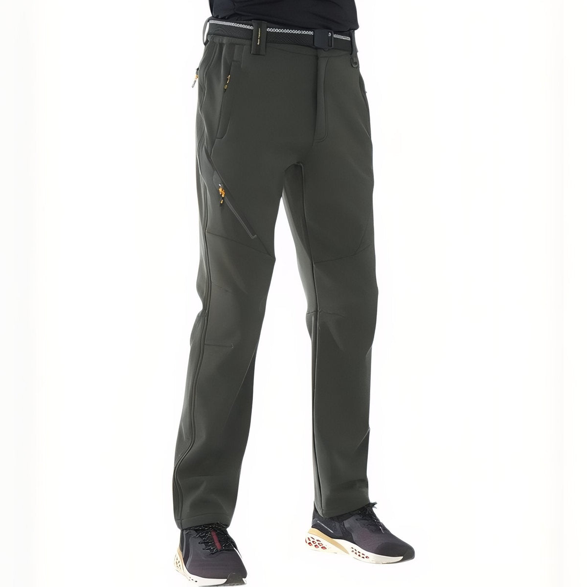Man wearing the dark green fleece-lined softshell hiking trousers with a belt, front view