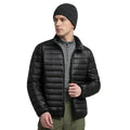 Man wearing the black lightweight puffer jacket open over a grey zip-neck top, front view