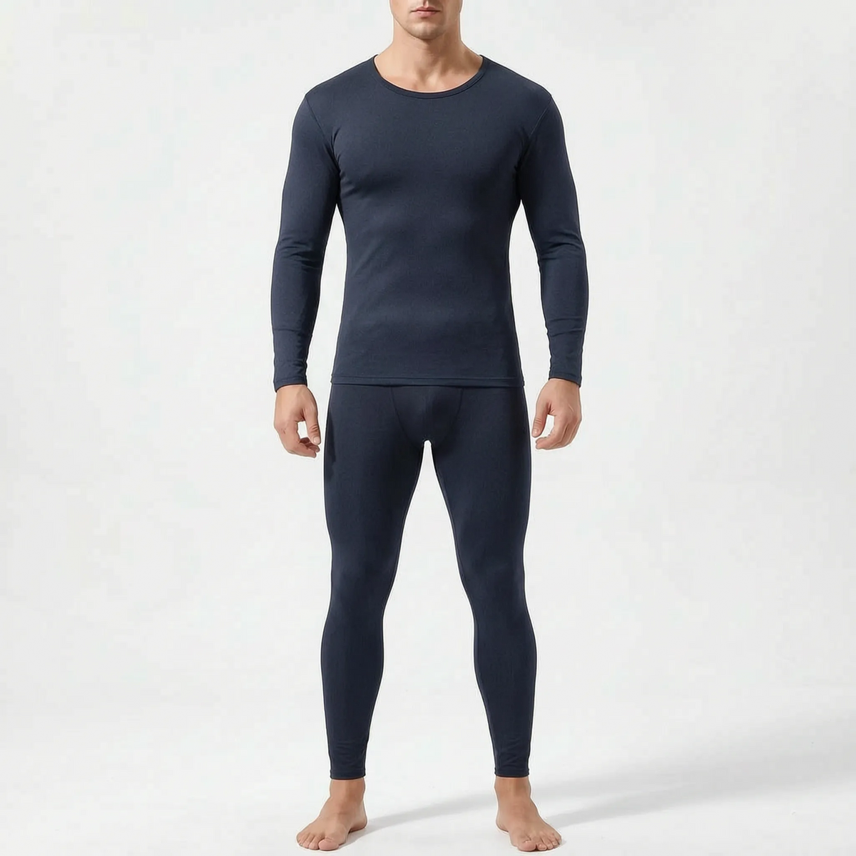 Man wearing the navy blue thermal base layer set, close-fitting crew-neck top and full-length leggings, front view