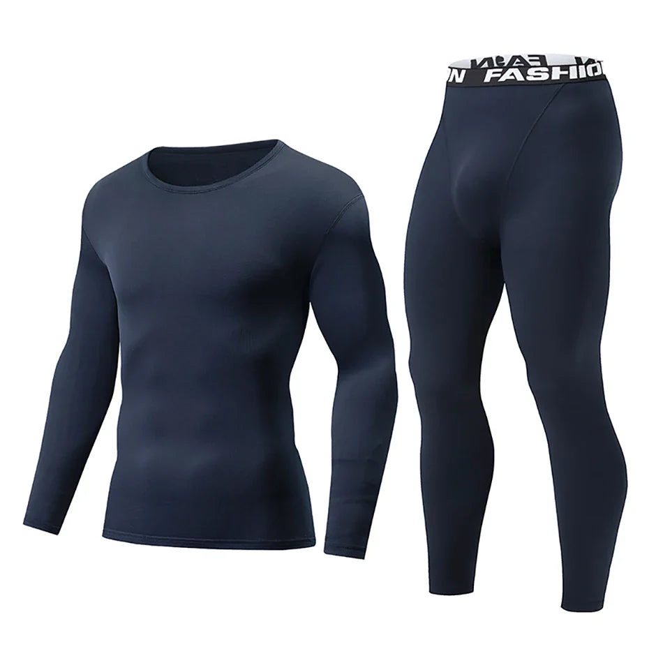 Navy blue thermal top and leggings shown side by side, the leggings with a wide printed elastic waistband