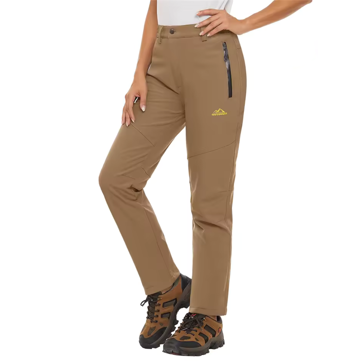 Woman wearing the sand fleece-lined softshell hiking trousers with brown hiking boots, front view