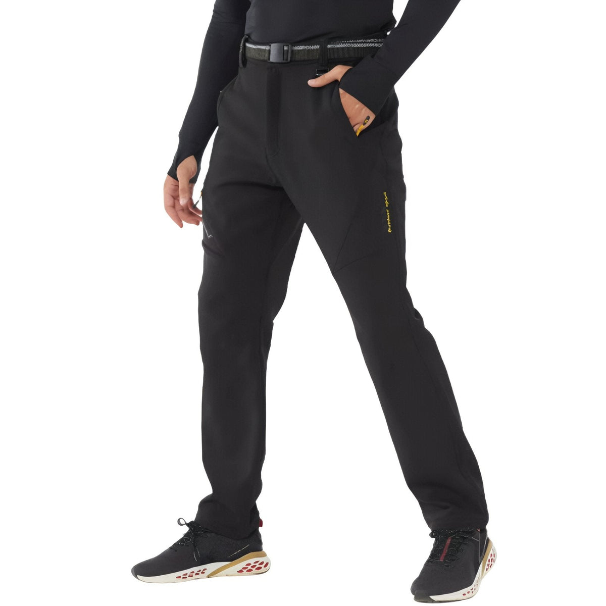 Man wearing the black fleece-lined softshell hiking trousers with a belt, front view