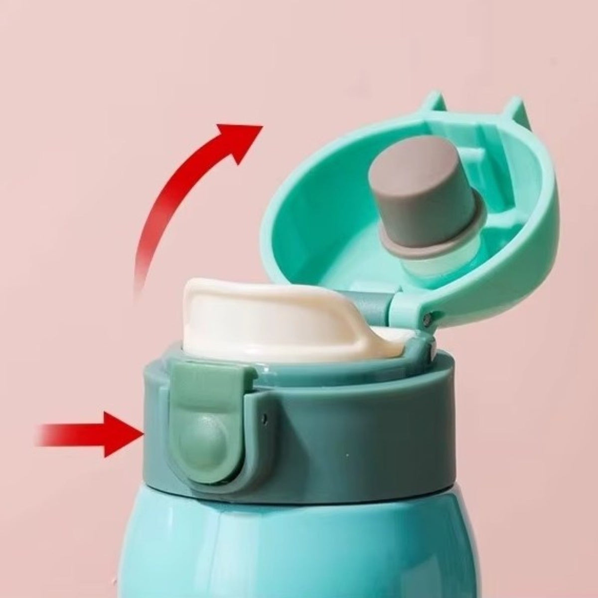 Turquoise bottle lid opening after the push button is pressed, showing the white spout