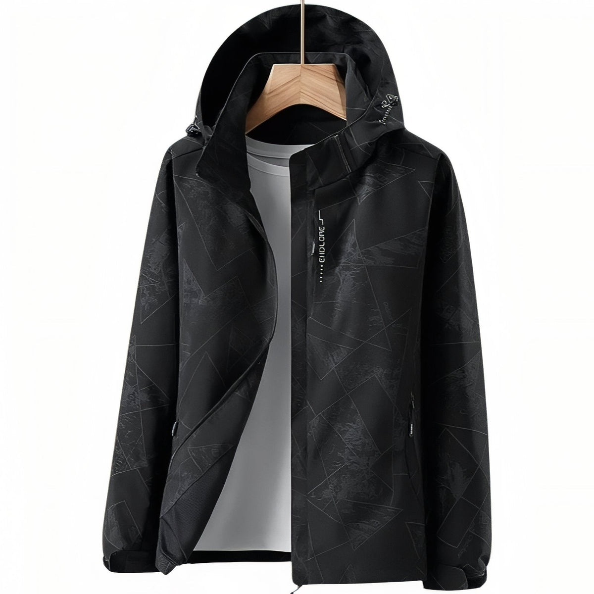 Black hooded hiking jacket with a tone-on-tone print, hanging open on a wooden hanger