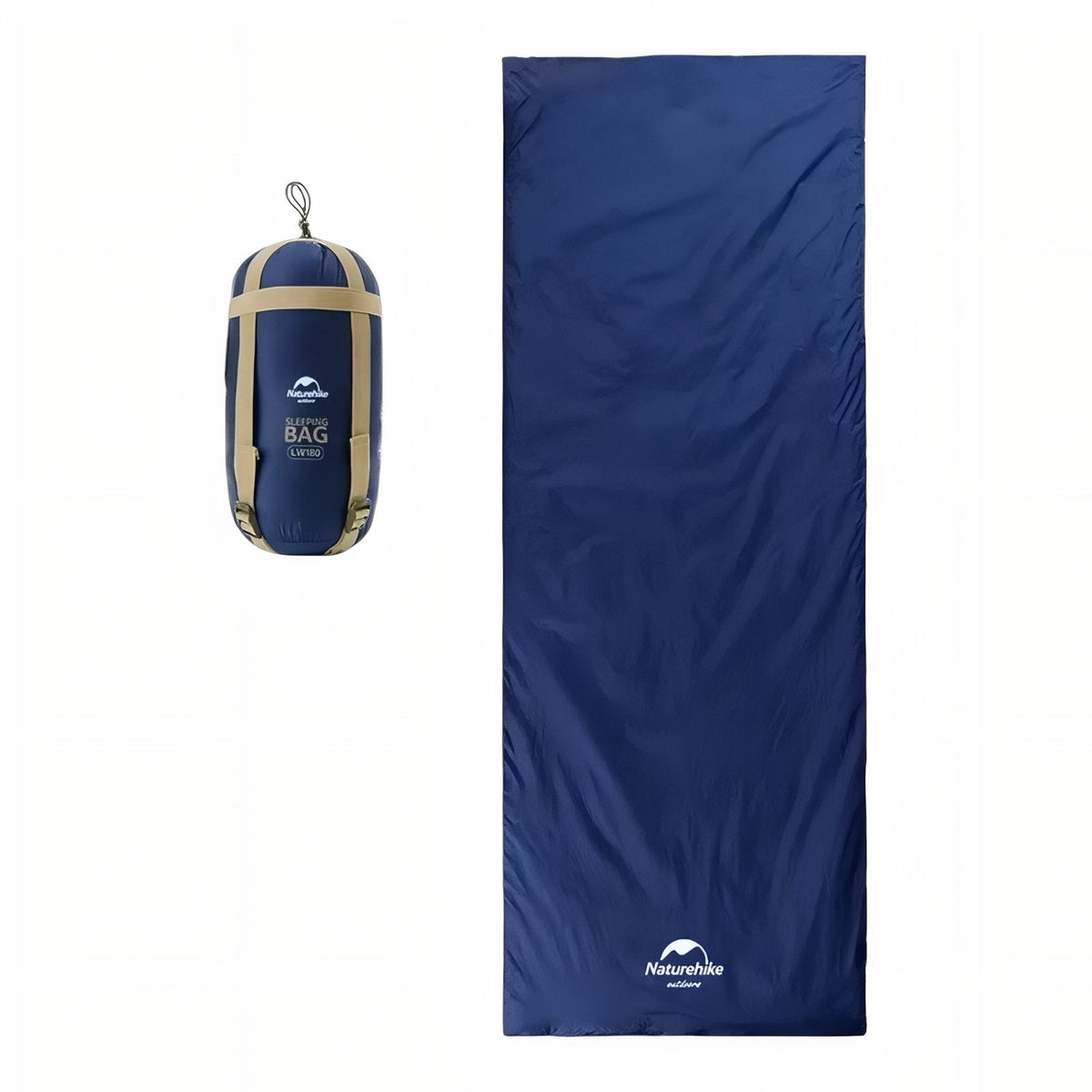 Navy blue envelope sleeping bag laid flat beside its packed compression sack
