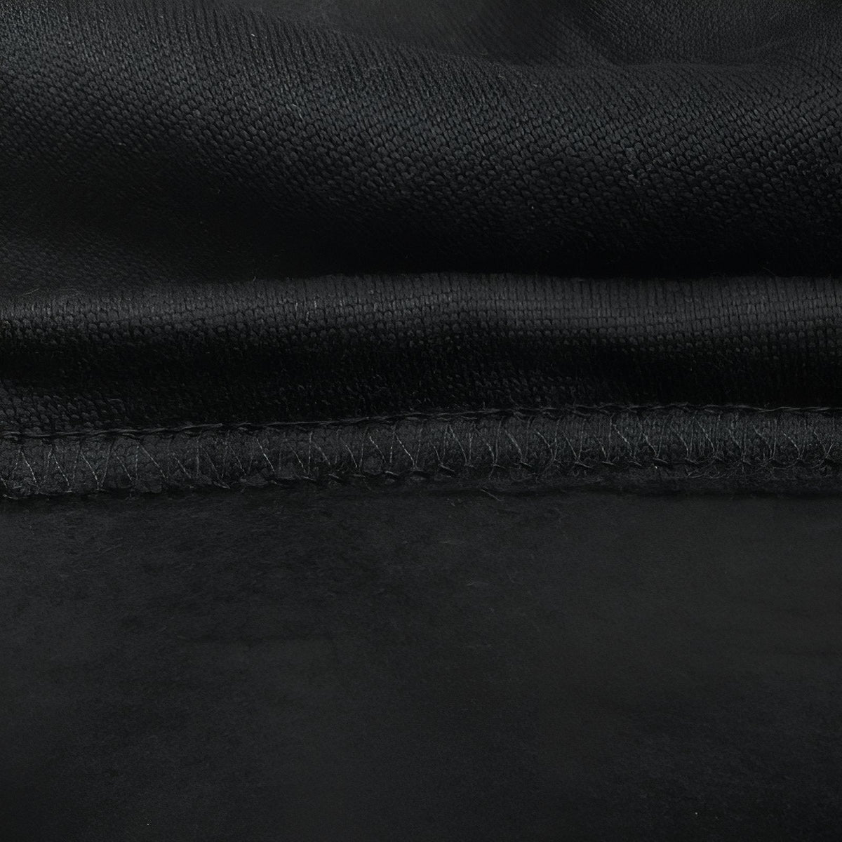 Close-up of the black knit with its soft brushed inside