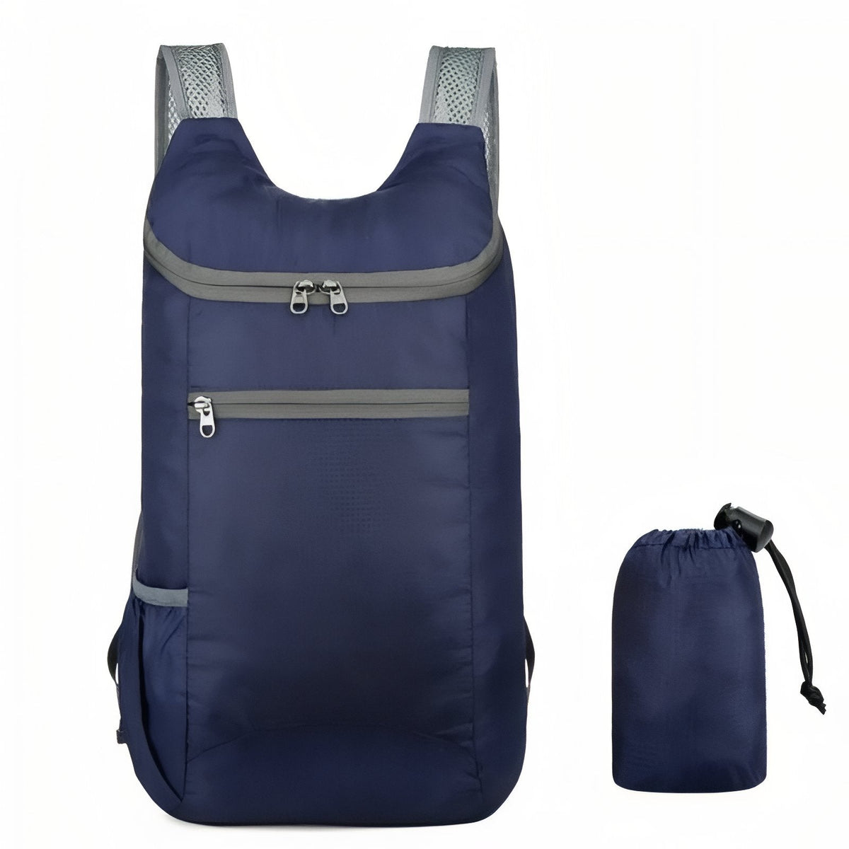 Navy blue packable daypack beside its drawstring stuff sack