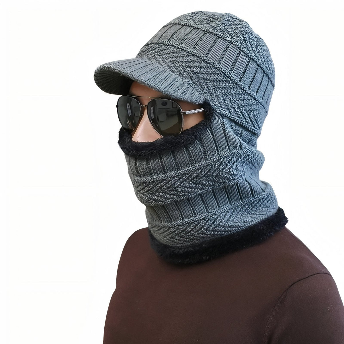 Man wearing the dark grey knitted balaclava with its brim and face panel up, with sunglasses