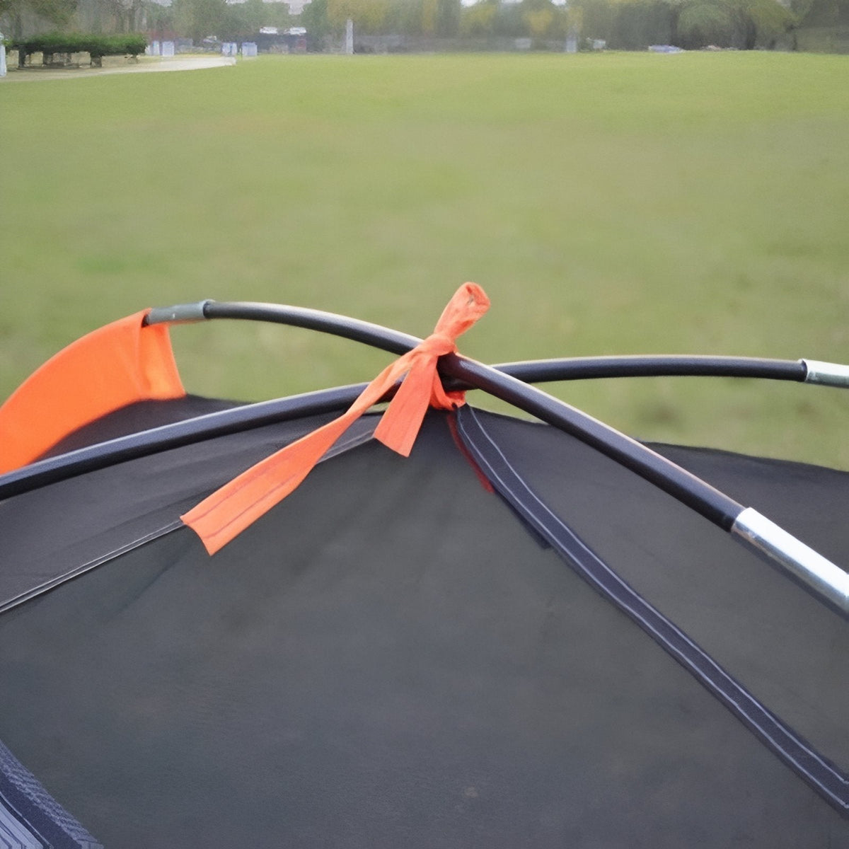 The two poles crossing at the top of the inner tent