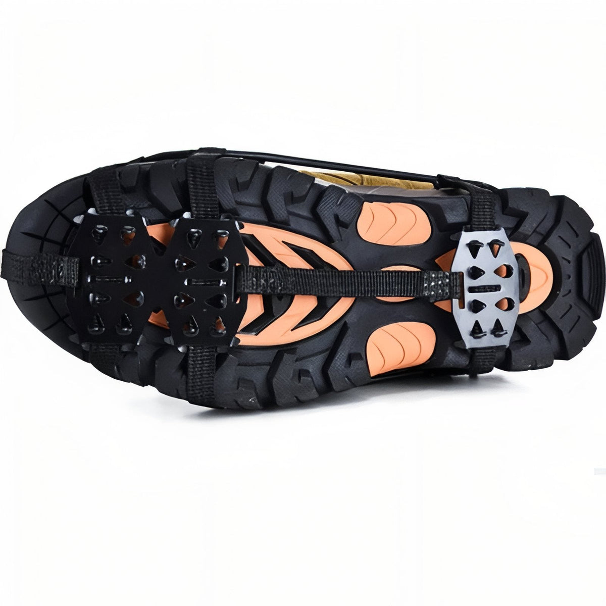 Underside of a boot fitted with the crampon: forefoot spike plate, heel plate and the rubber harness running along the sole