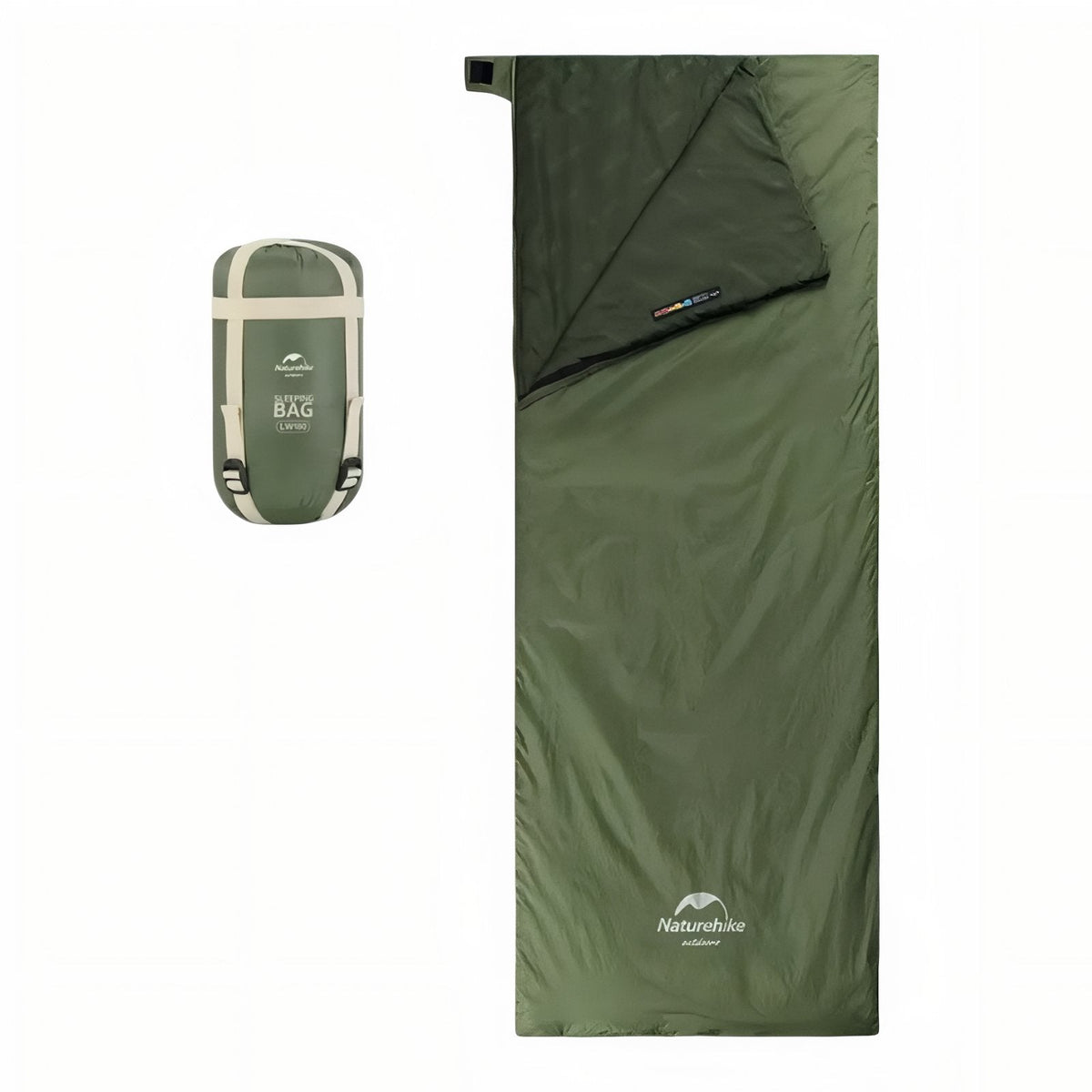 Green envelope sleeping bag laid flat with its dark green lining folded back at the head, beside its packed compression sack