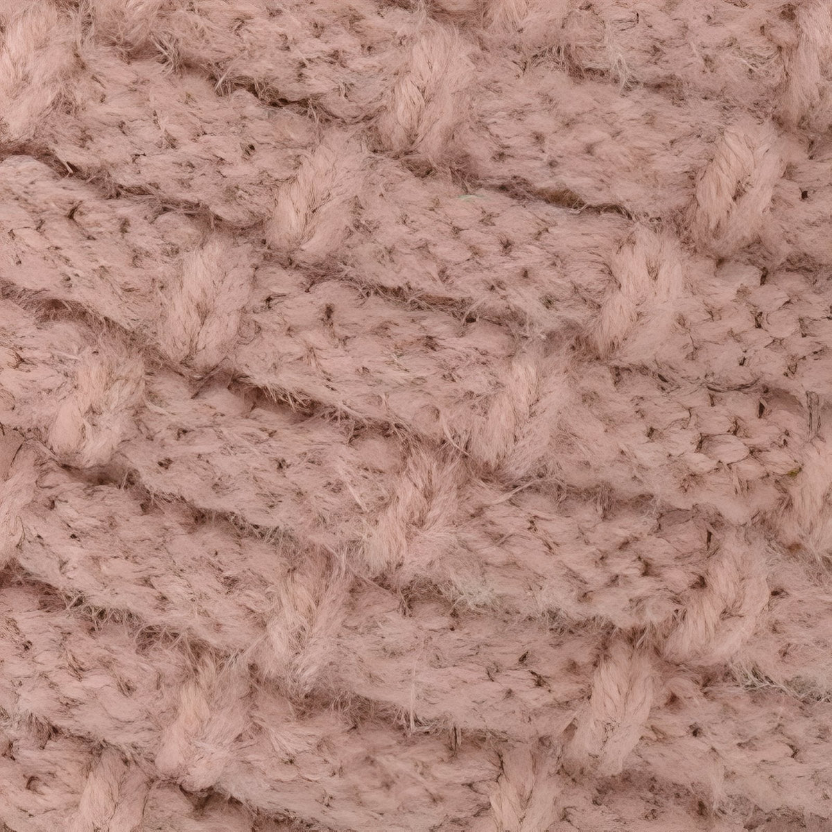 Close-up of the textured knit with rows of small raised stitches