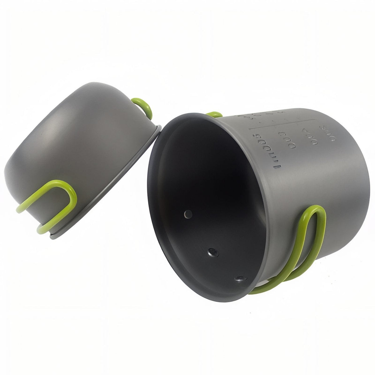 The shallow pot beside the tall pot, tipped to show the insides and the folding handles
