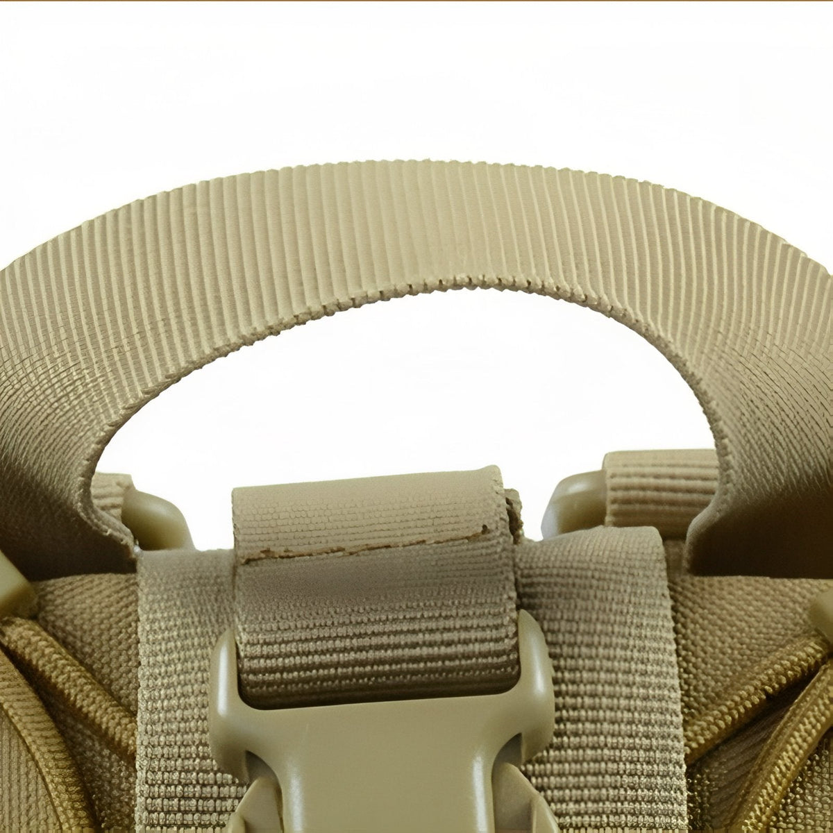 Close-up of the khaki pouch's webbing handle and buckle