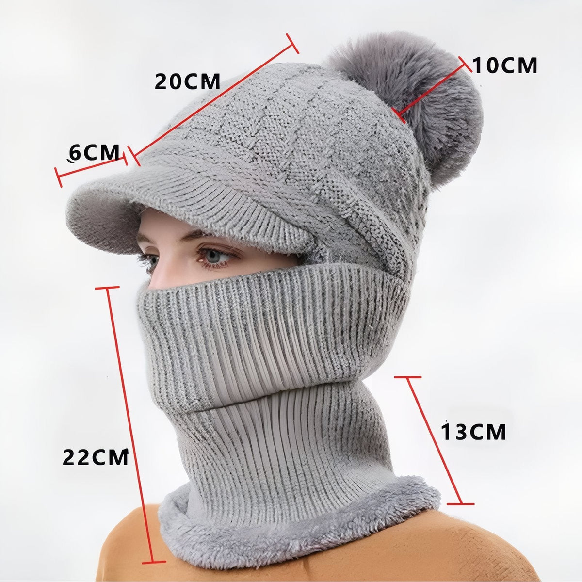 Light grey brim beanie on a model marked 20 cm crown, 6 cm brim, 10 cm pompom and 22 cm neck warmer