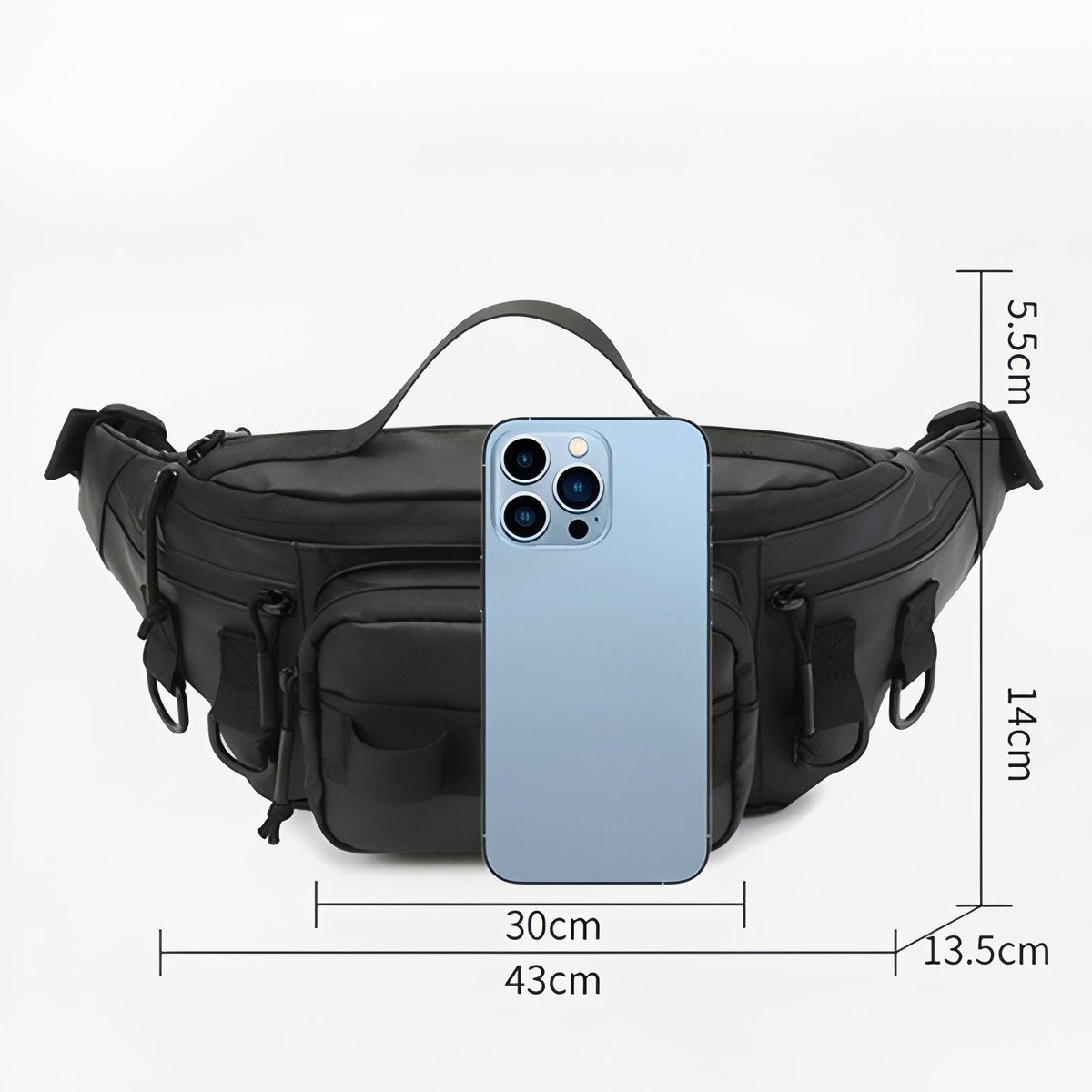 Black hip pack with a smartphone in front for scale, measuring 43 cm wide, 30 cm across the front, 14 cm tall and 13.5 cm deep