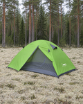 Lime green two-person dome tent pitched on pale reindeer lichen at the edge of a pine forest, its door open to the grey mesh inner tent