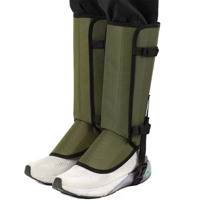Army green hiking gaiters worn over white trail shoes, front view